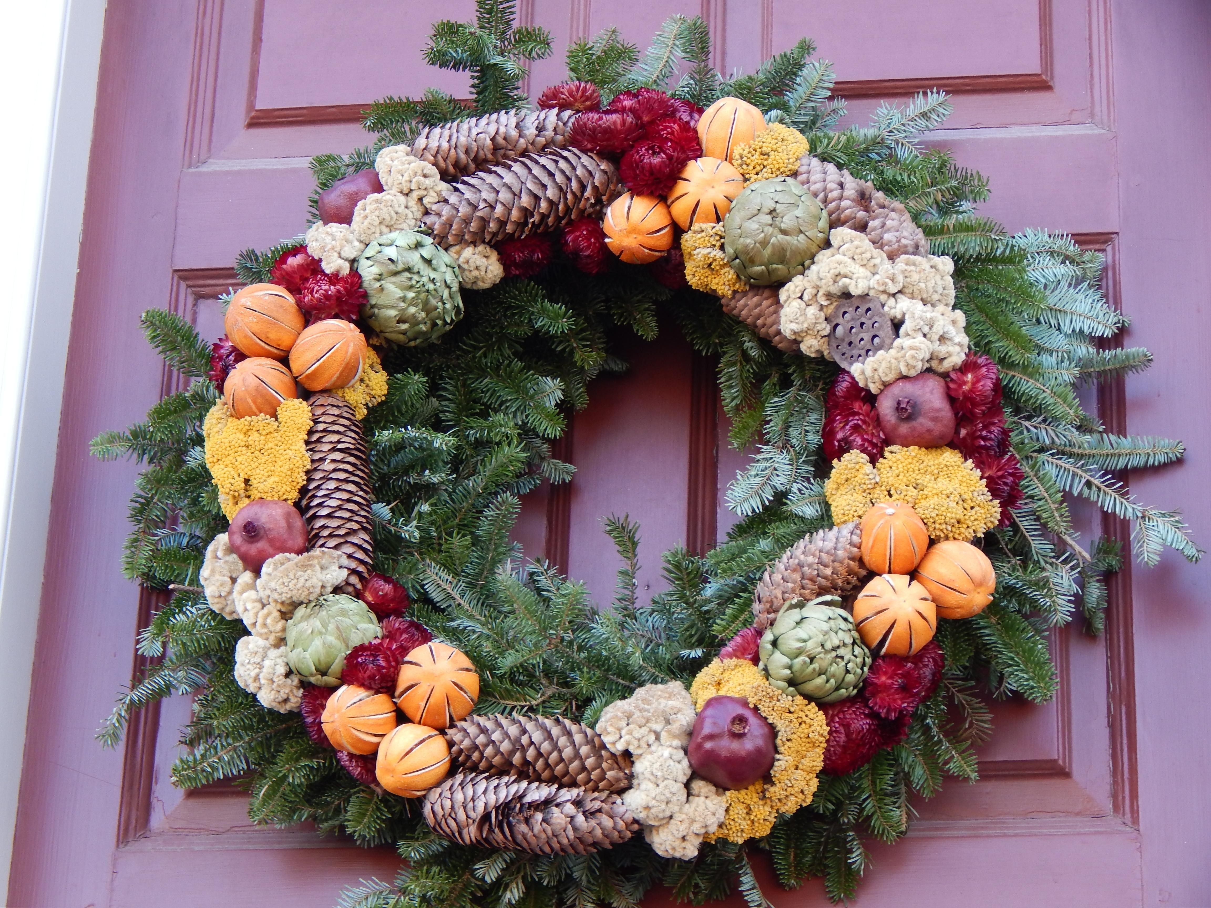 green red orange and brown christmas wreathg