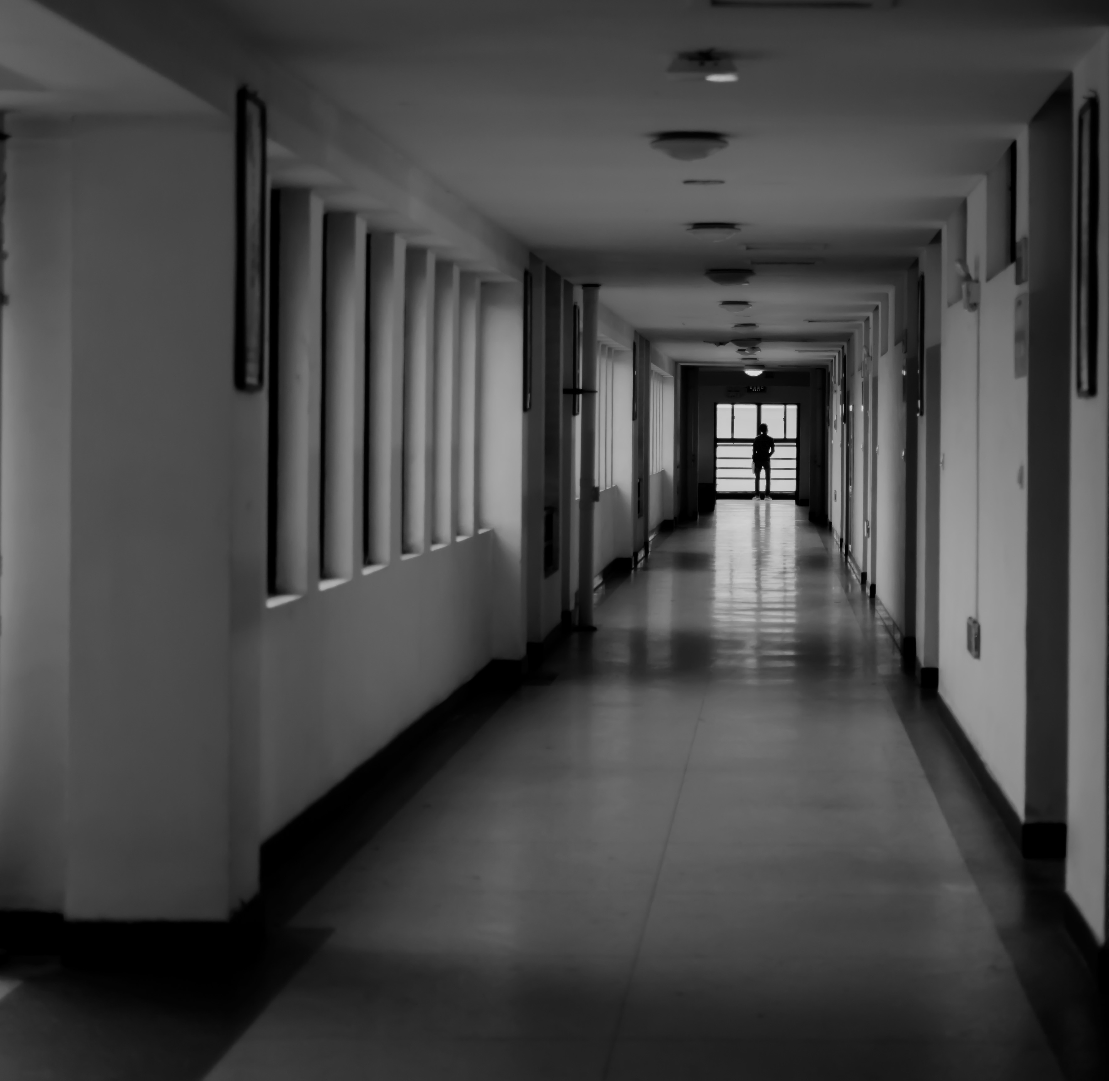 grayscale photo inside building