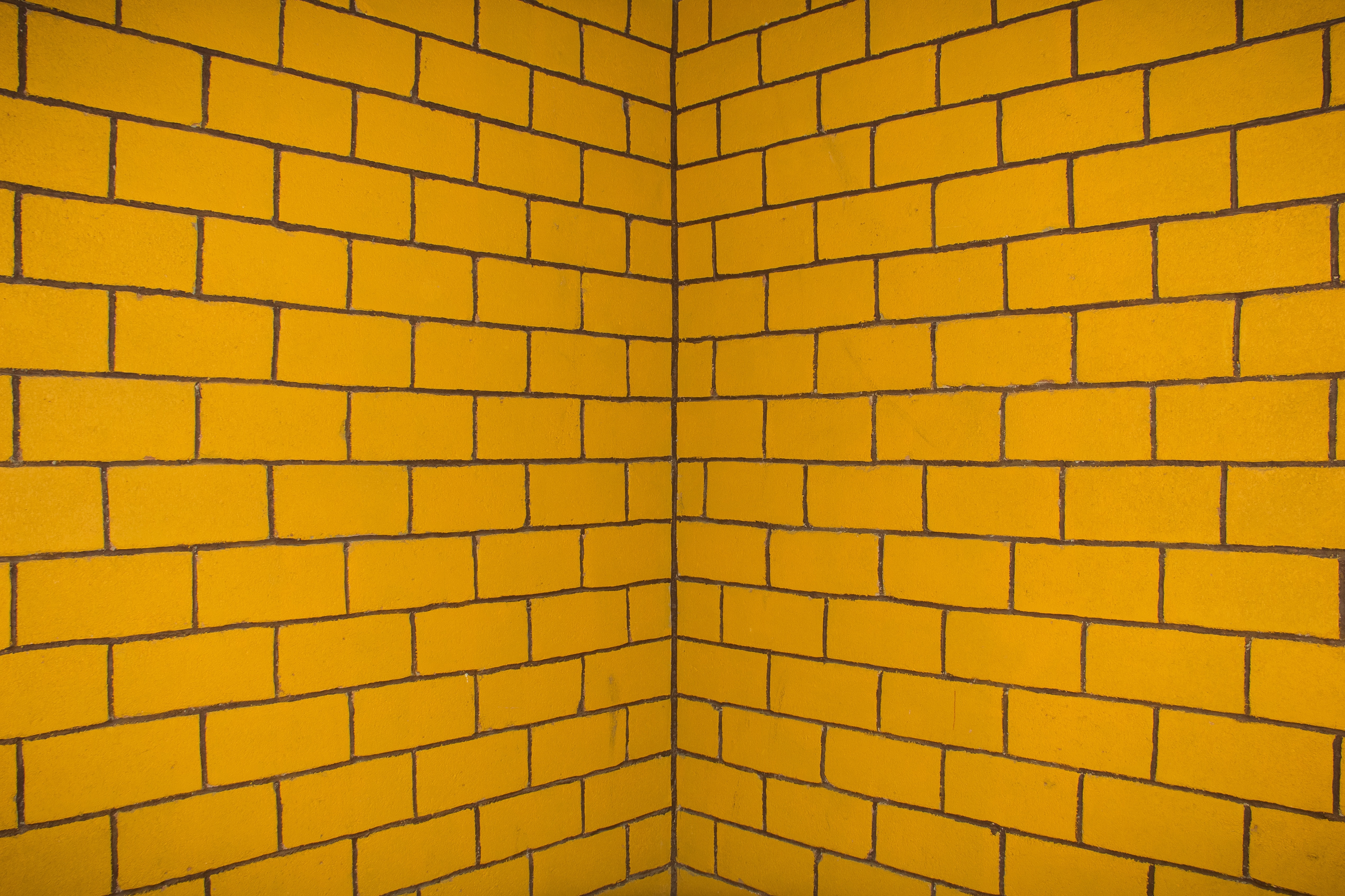 yellow and black brick wall