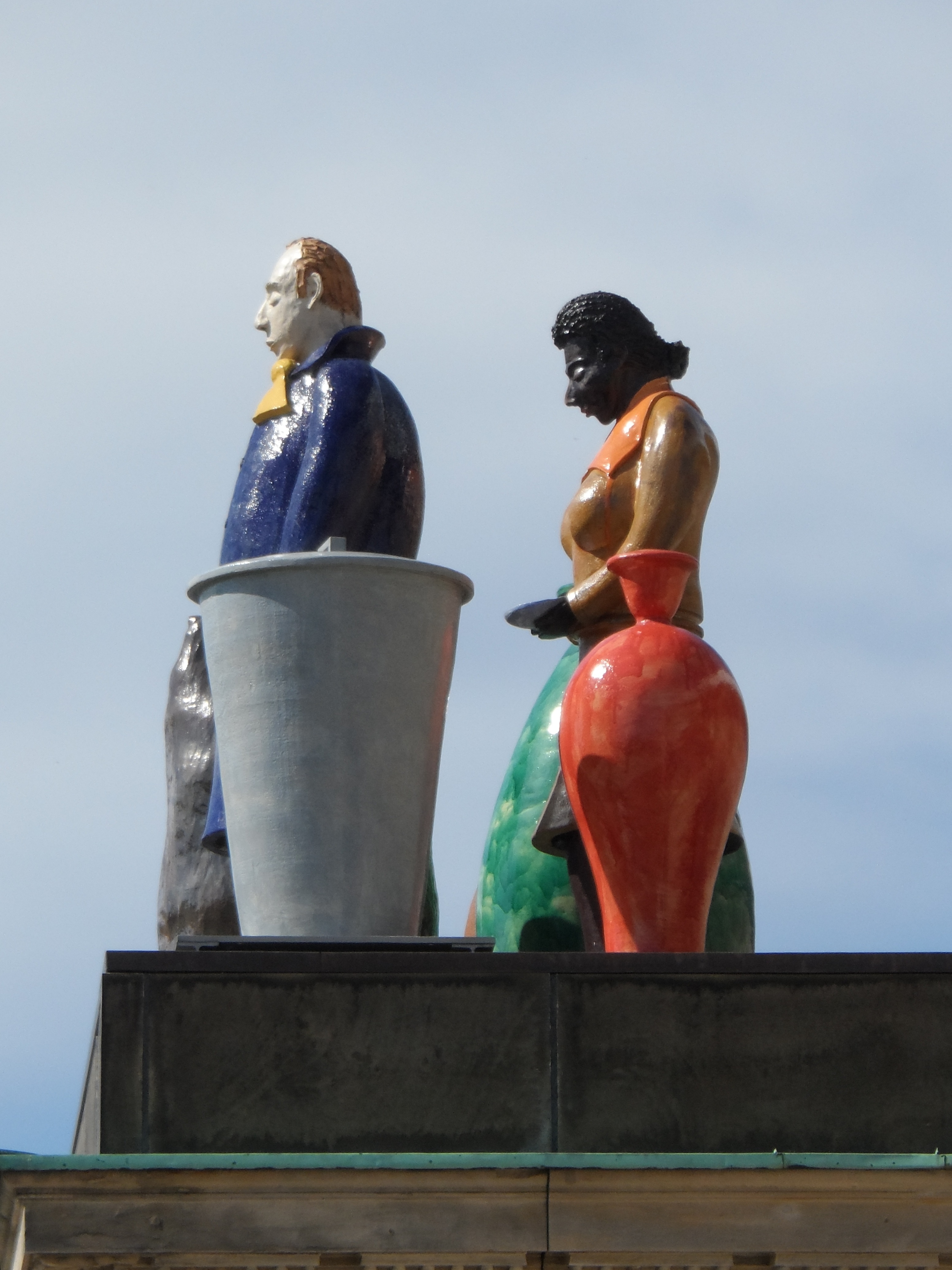 man and woman ceramic figurine