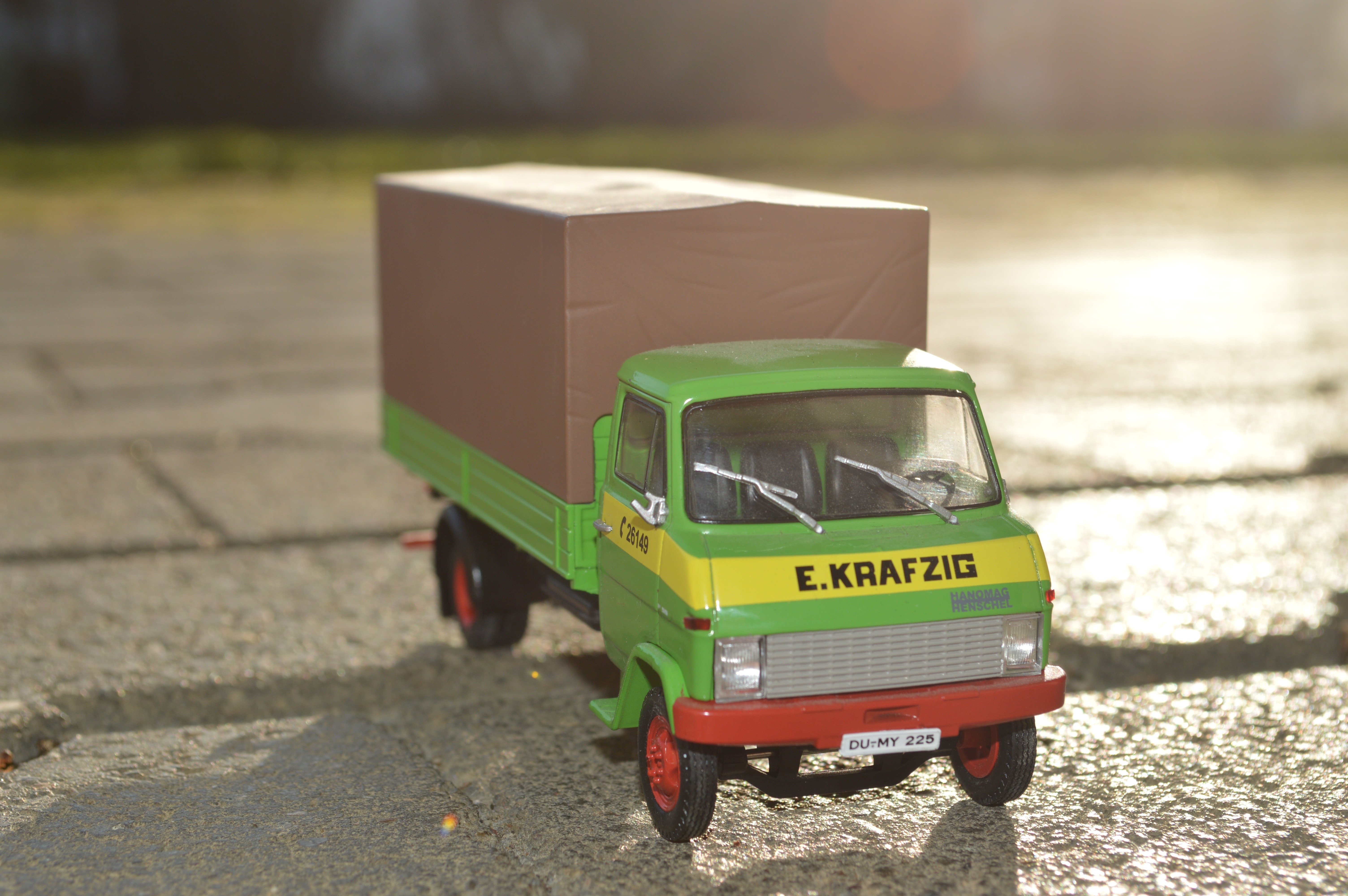 green and brown truck toy