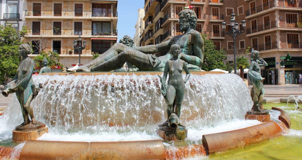 outdoor fountain with human statues preview