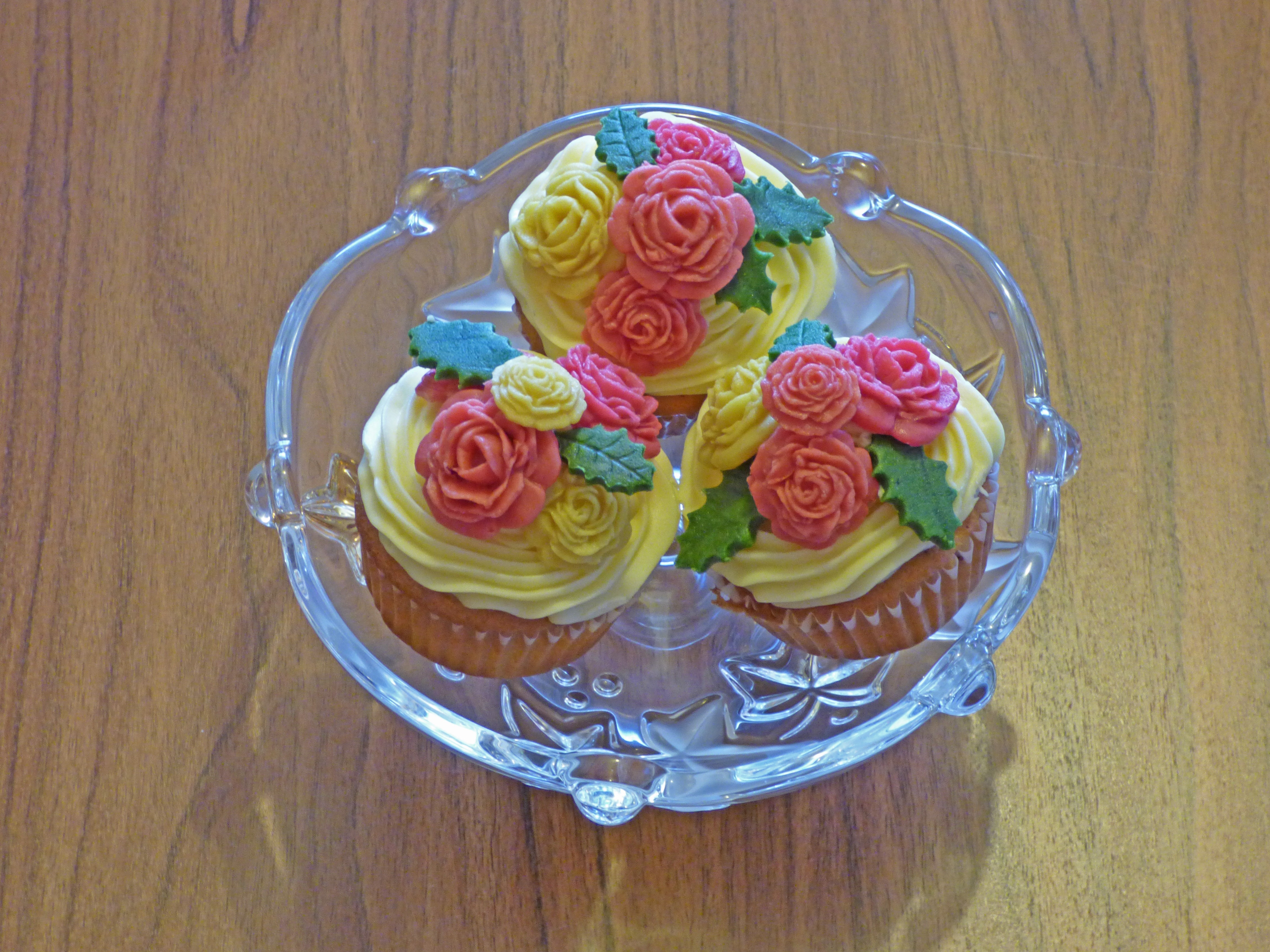 clear glass bowl with three cupcakes