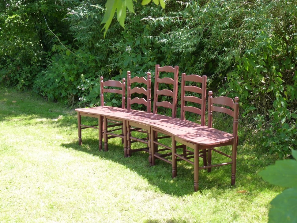 five brown wooden chairs preview