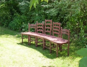five brown wooden chairs thumbnail