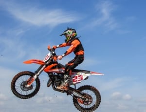 black-and-red motocross dirtbike thumbnail