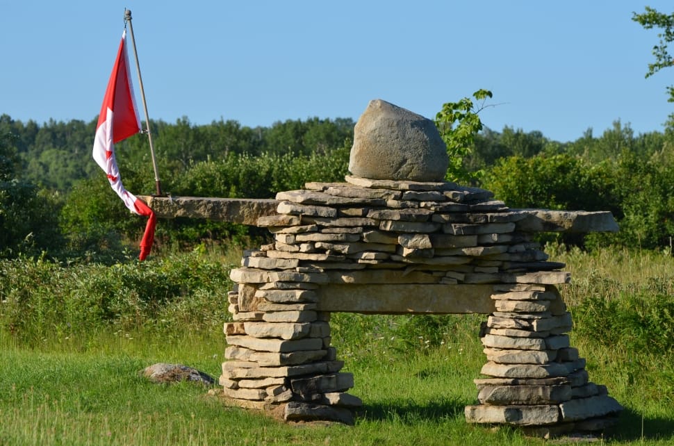 stack of stones with flag preview