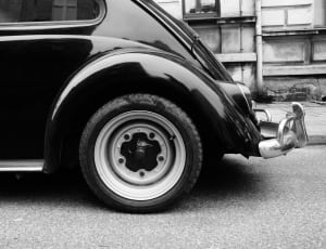 black and white photo of car thumbnail