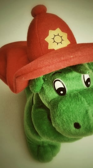 red and green plush toy thumbnail
