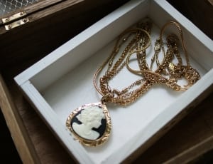 black and white cameo pendant gold necklace in box thumbnail