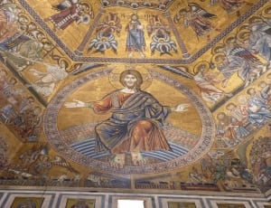 brown and blue religious wall painting thumbnail