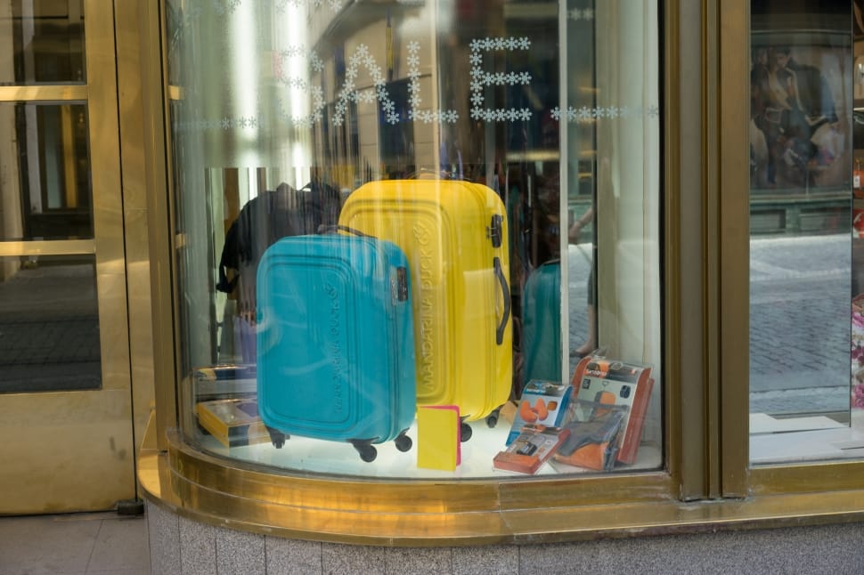 blue and yellow luggages preview