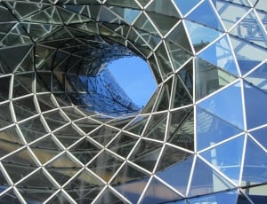 glass wall architectural building during daytime thumbnail