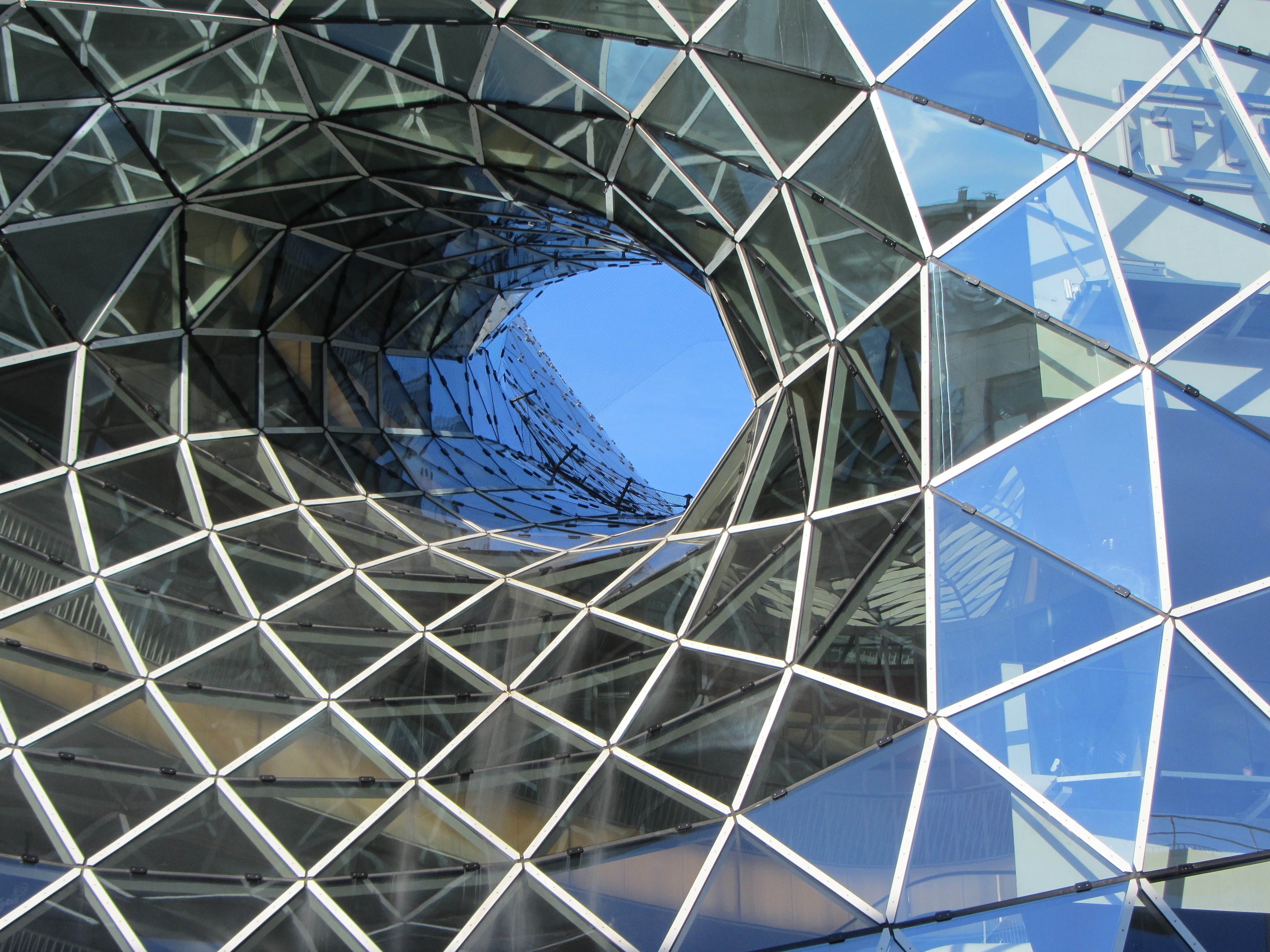 glass wall architectural building during daytime