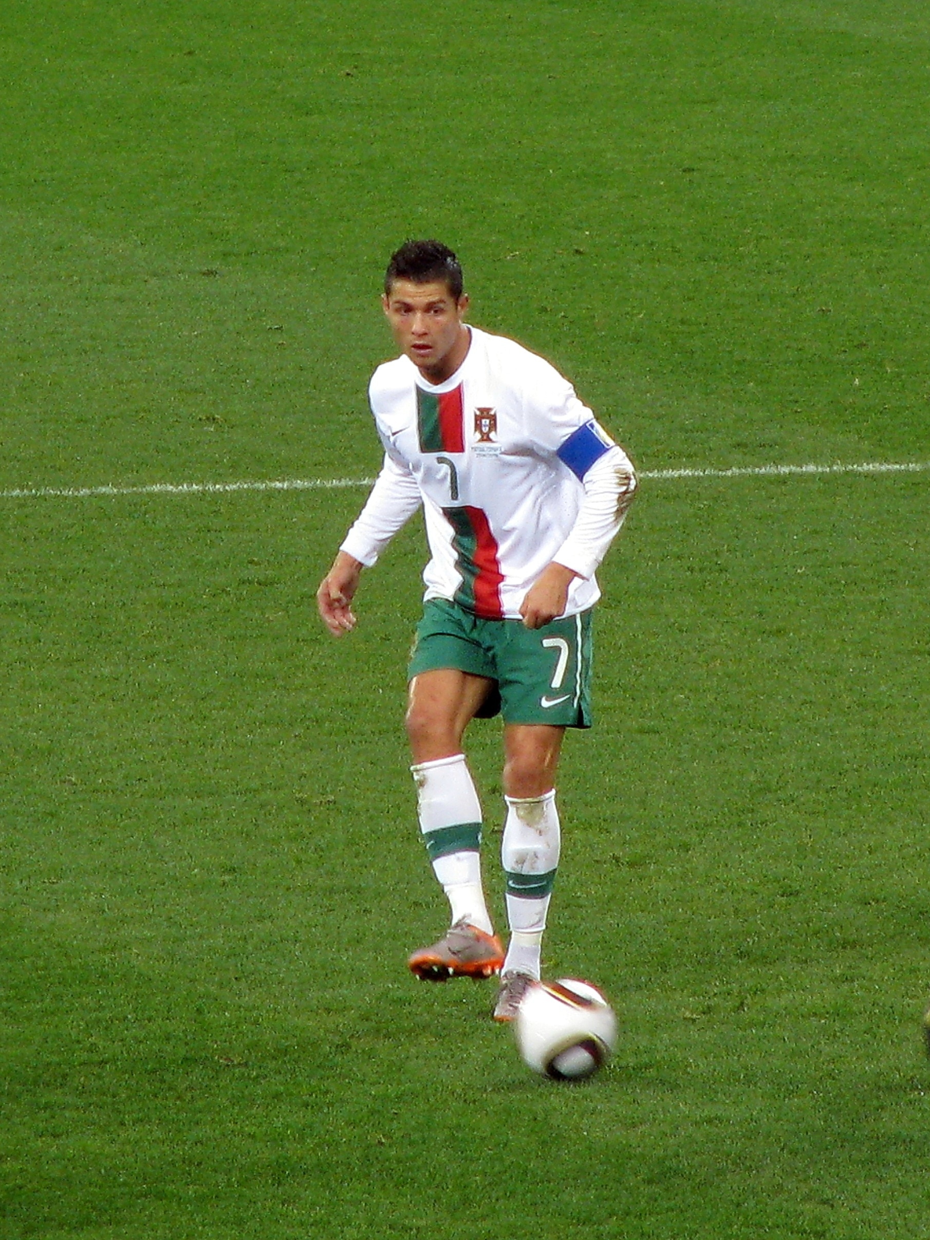 men's white green and red soccer uniform
