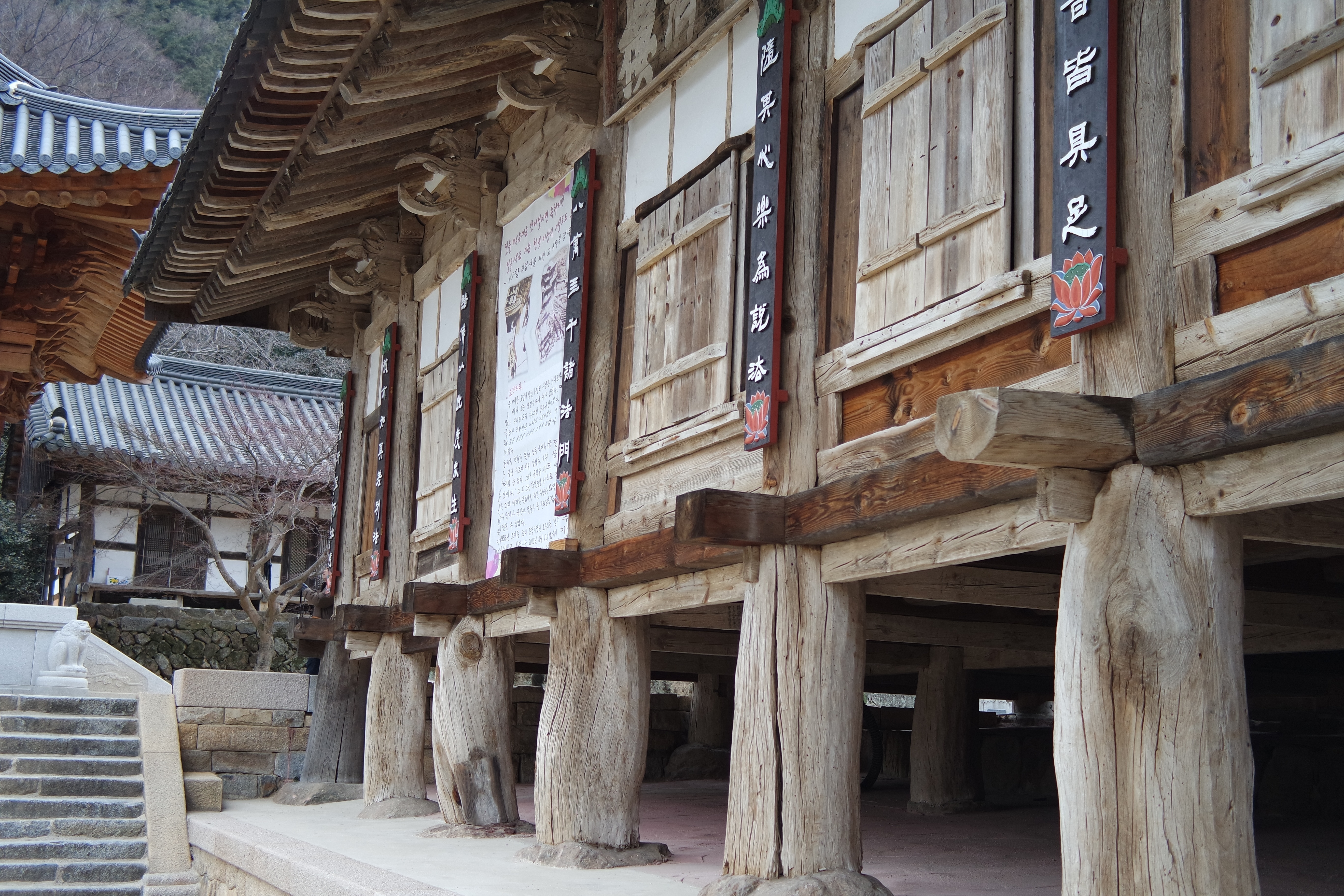 brown wooden kanji script signage house