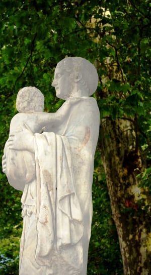 religious woman carrying a child statue thumbnail