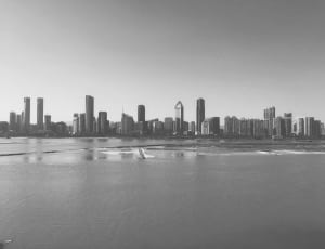 grayscale photo of high rise buildings thumbnail