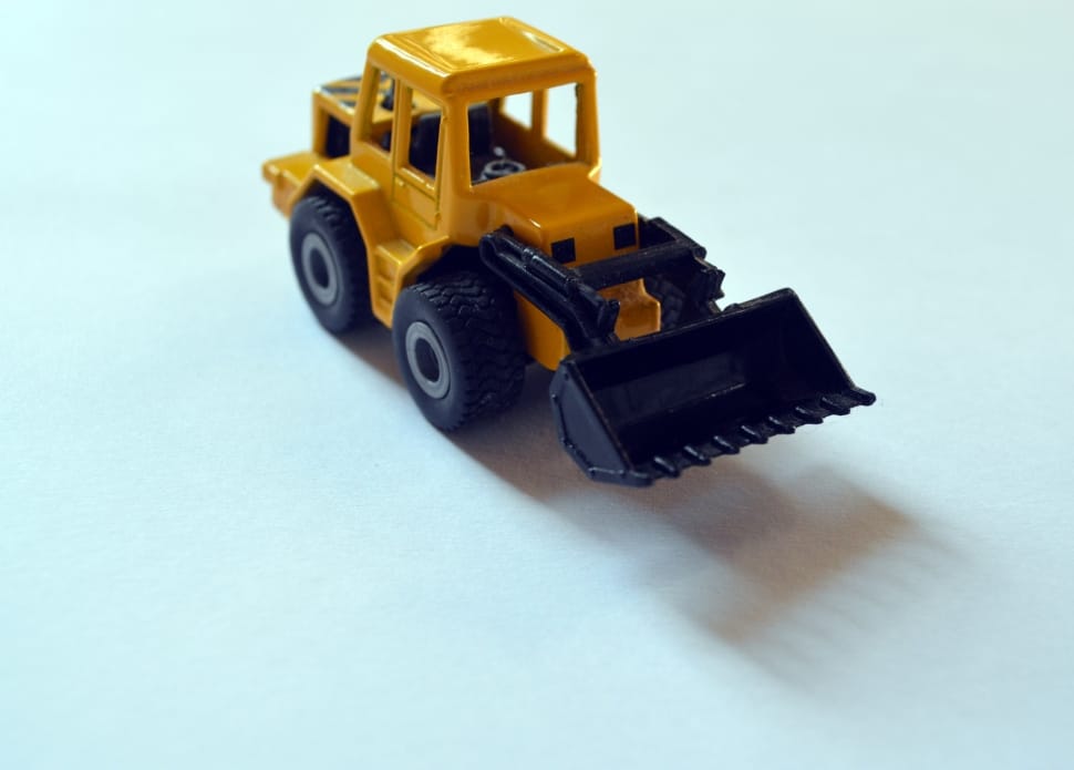 toddler's yellow and black front loader toy preview