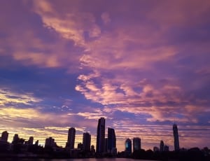 silhouette of city skyscraper during sunset thumbnail