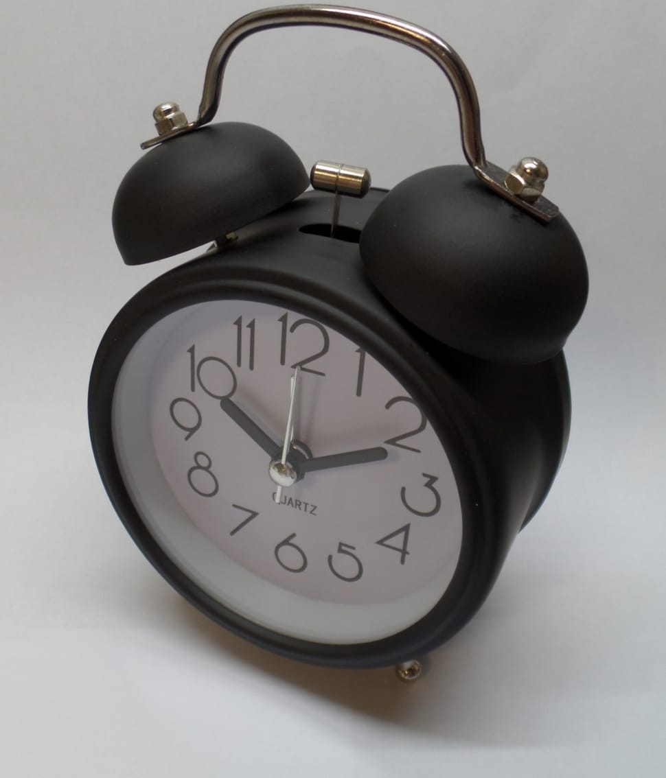 black analog alarm clock preview