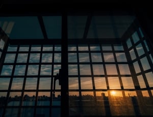 silhouette of window frame during sunset thumbnail