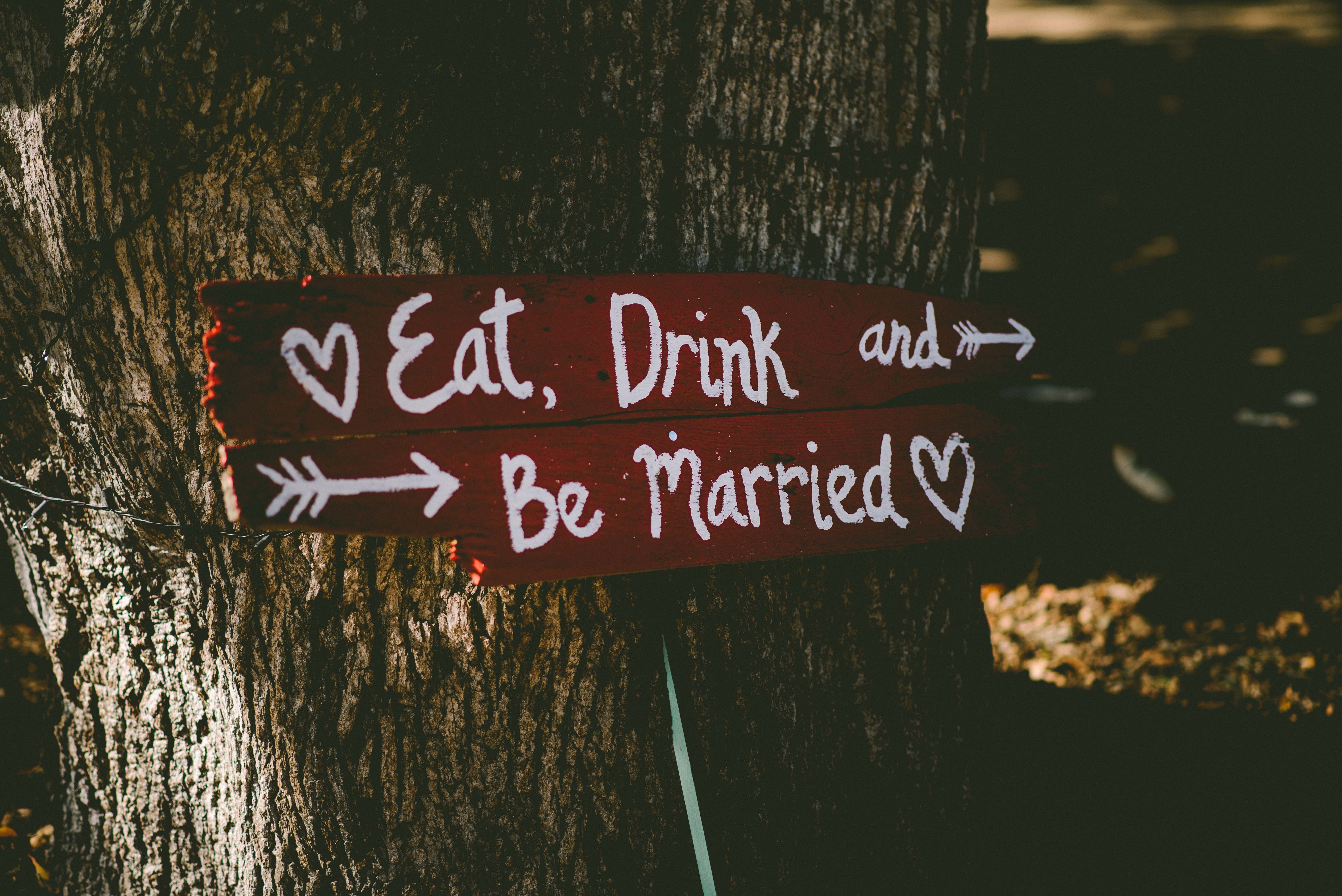 eat drink and be married signage