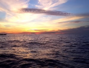 sailing boat during sunset thumbnail