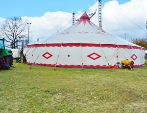 white and red carnival tent thumbnail