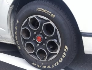 black nascar car tire thumbnail