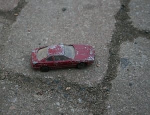 red coupe die-cast model thumbnail