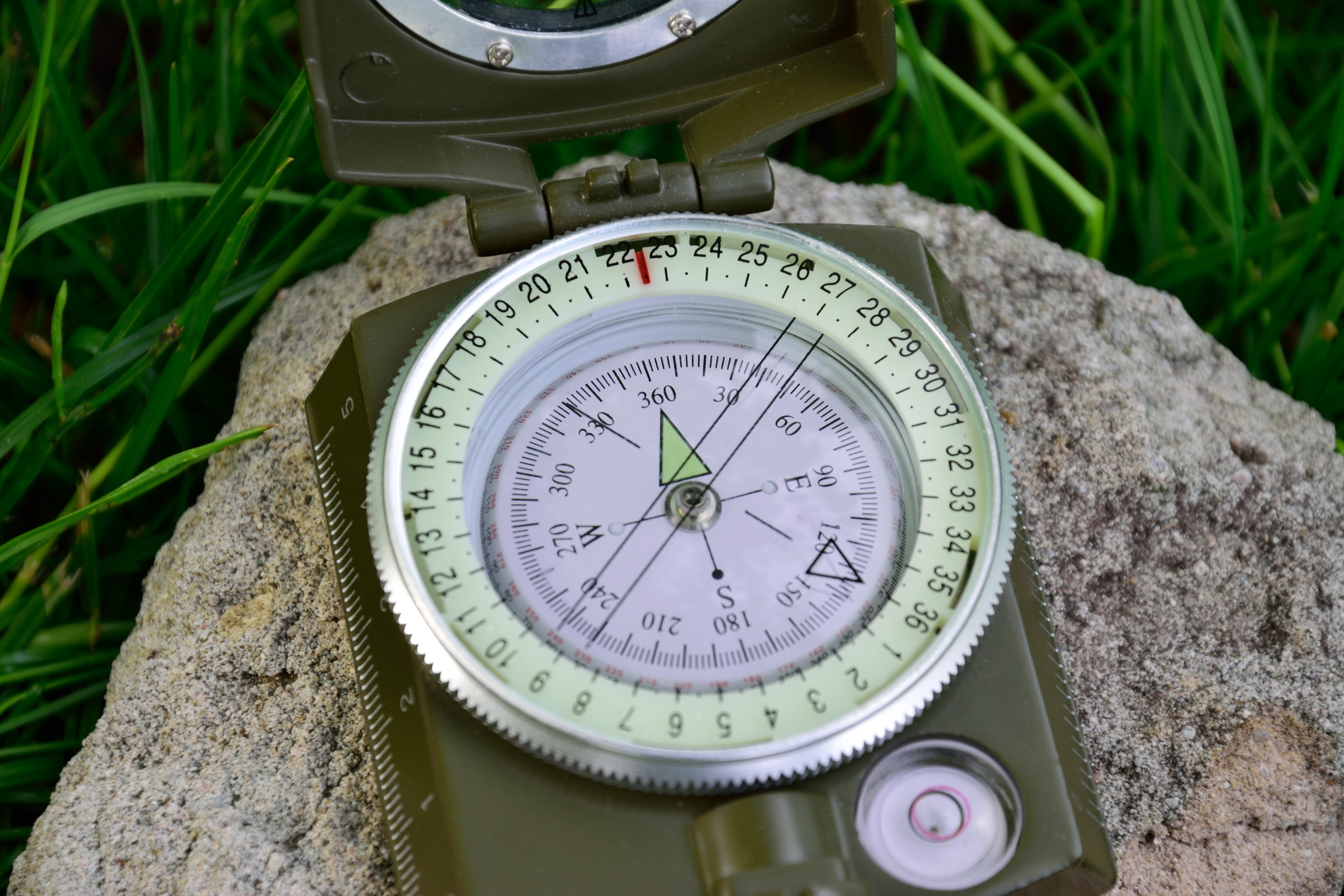 silver round face compass