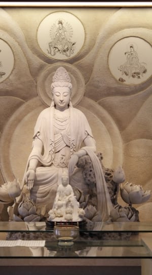 white buddha figurine thumbnail