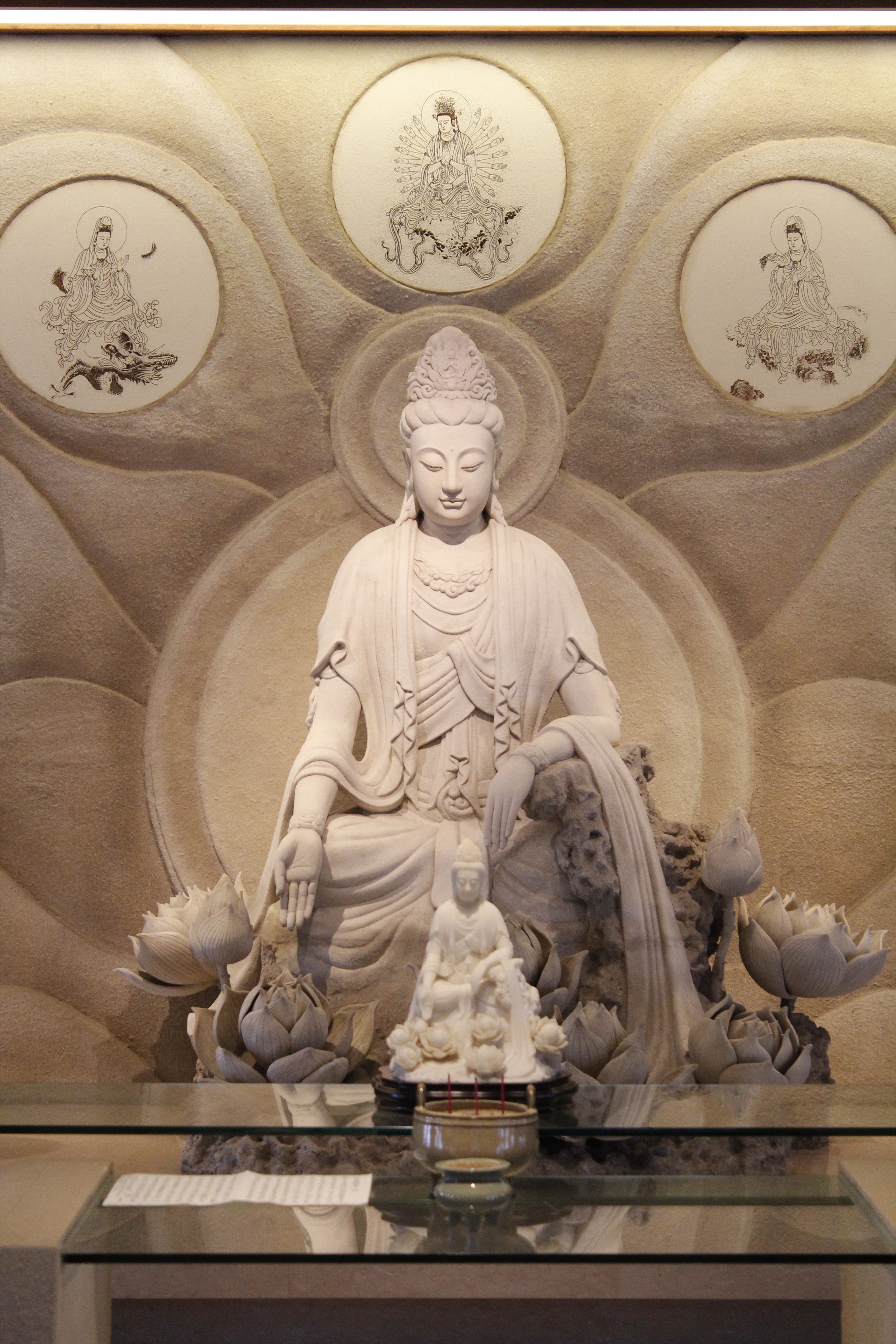 white buddha figurine