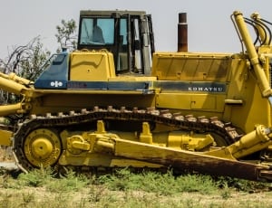 yellow komatsu bulldozer thumbnail