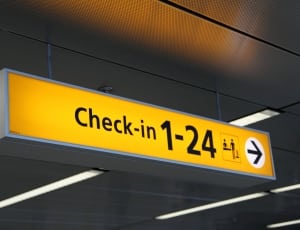 yellow and silver check in 1-24 signage thumbnail