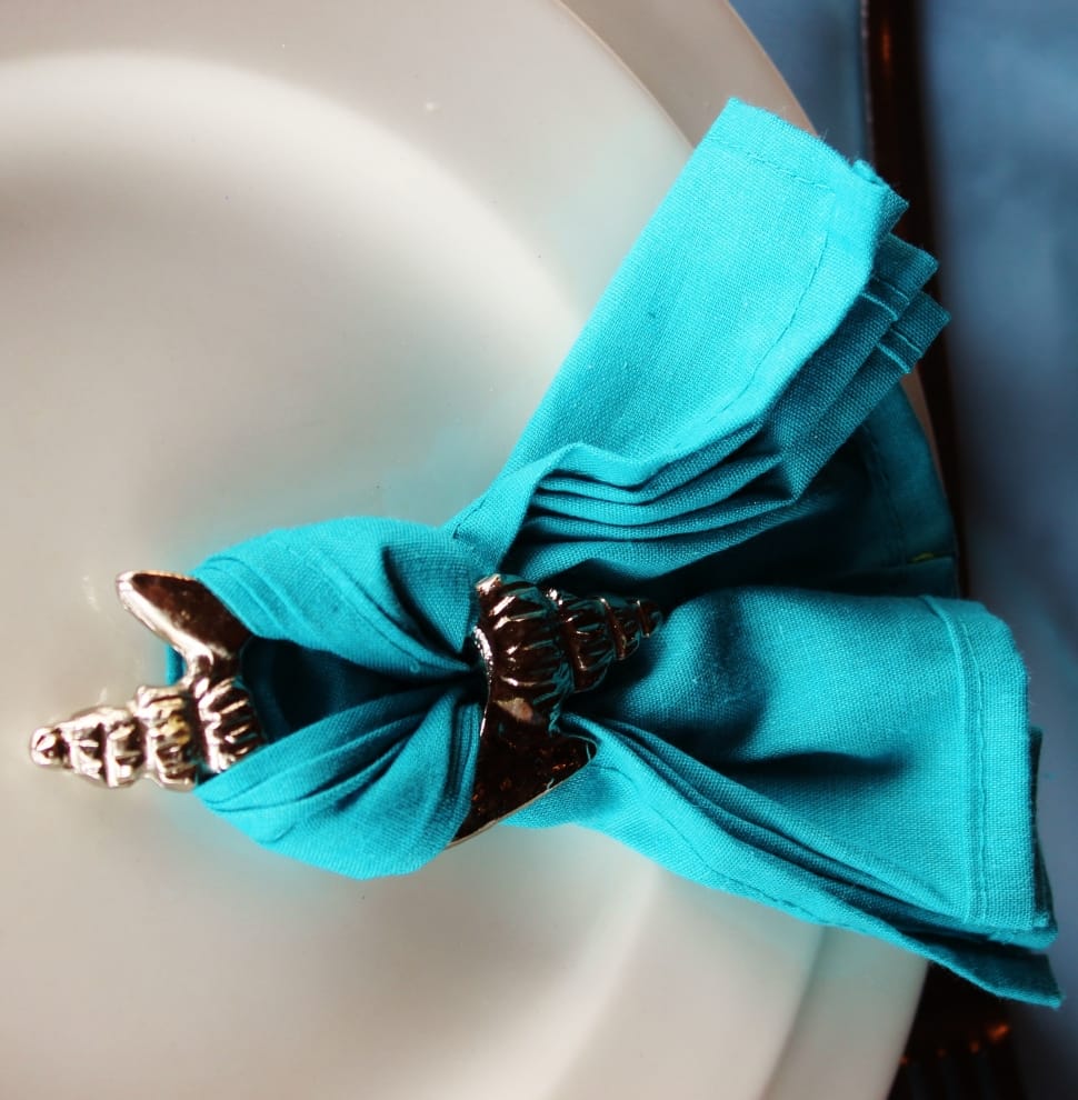 blue face towel wrapped around brass steel frame preview