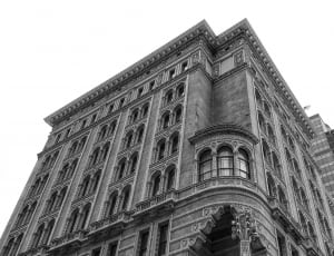 gray scale photo of vintage building thumbnail