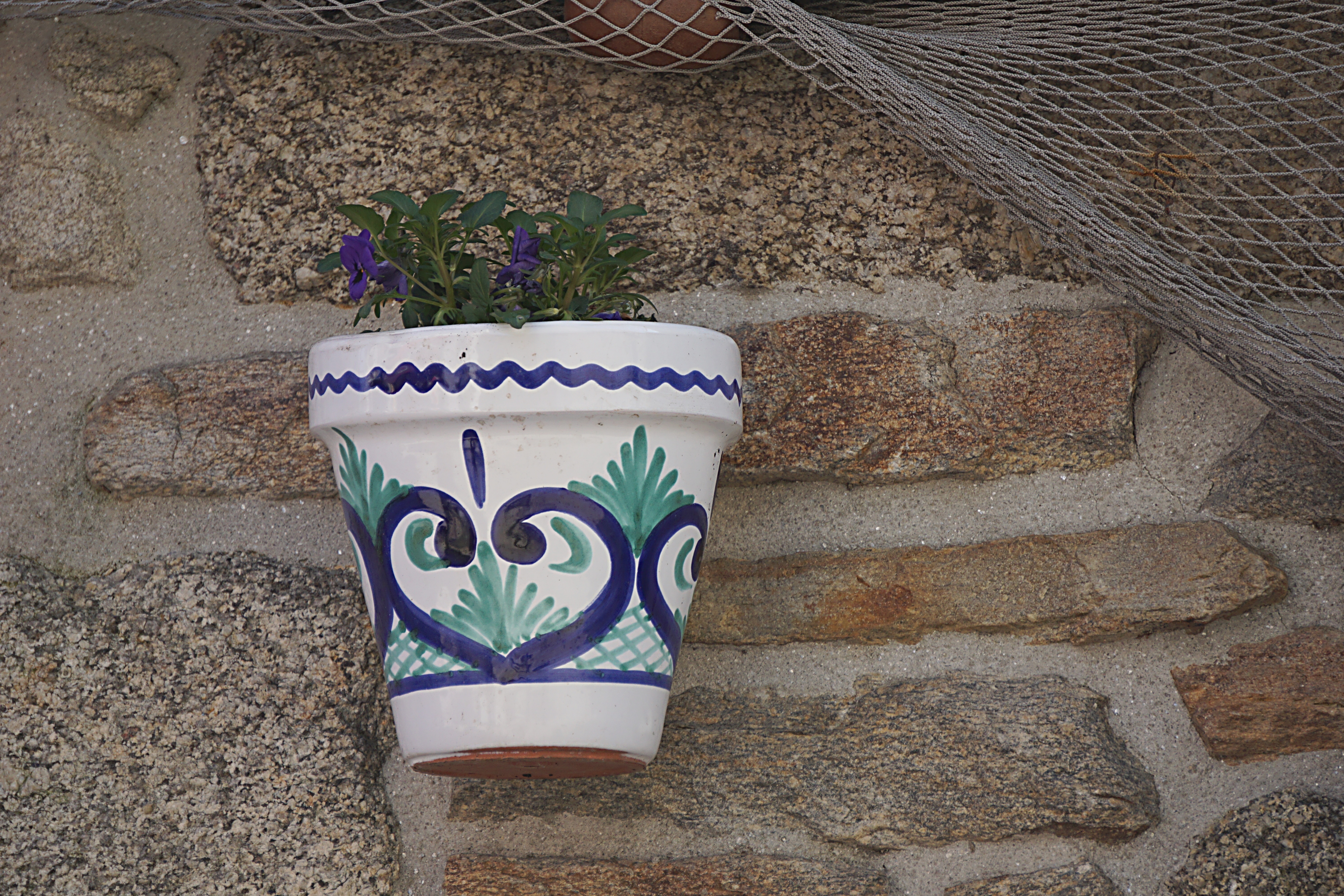 white blue and green clay plant pot