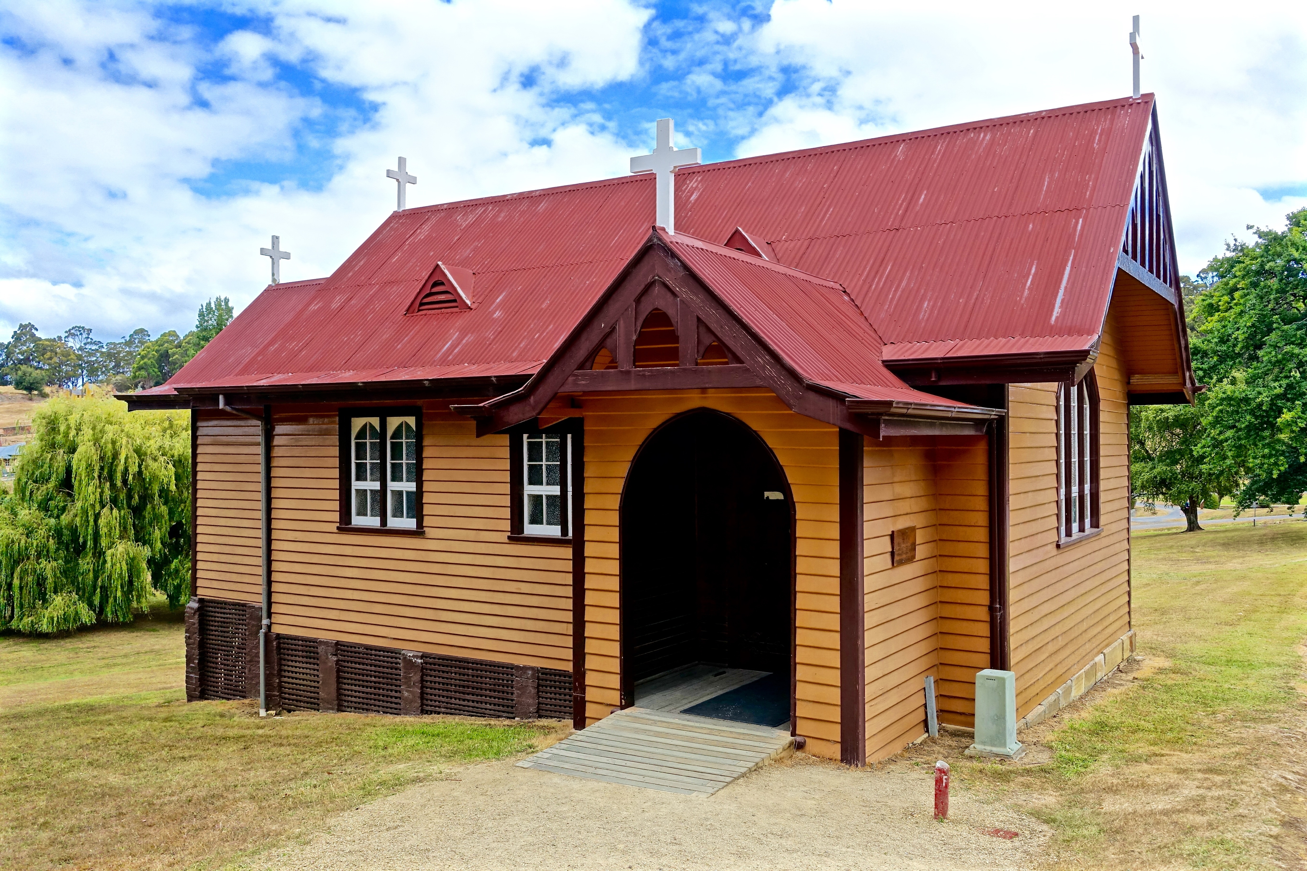 beige and red roof chapel