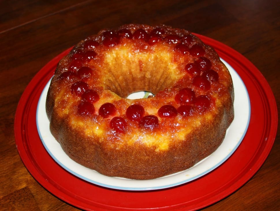 baked round cake with strawberry toppings preview