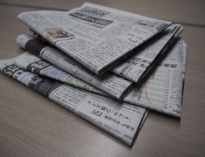 close up photo of newspapers thumbnail