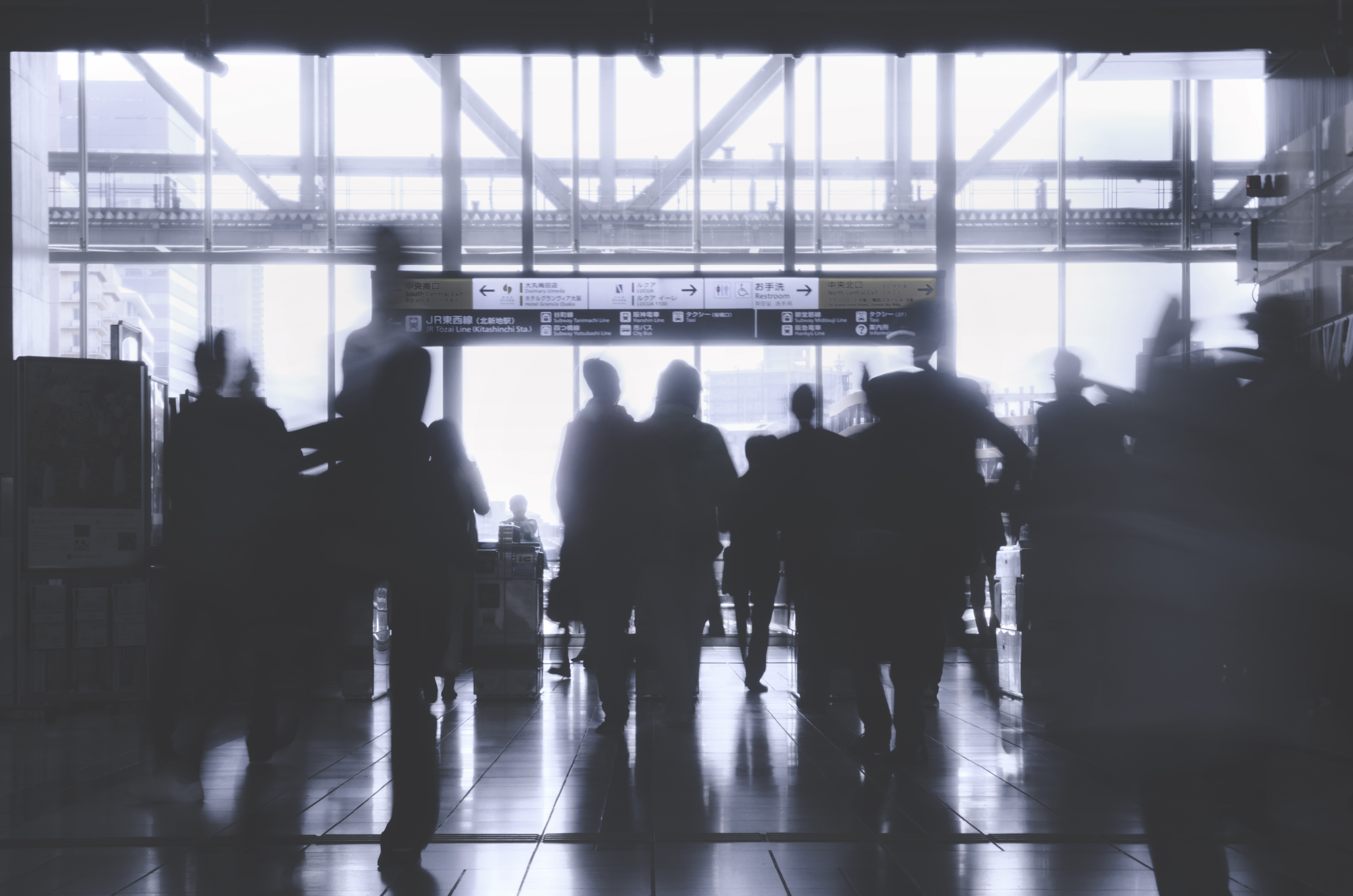 silhouette of people in terminal