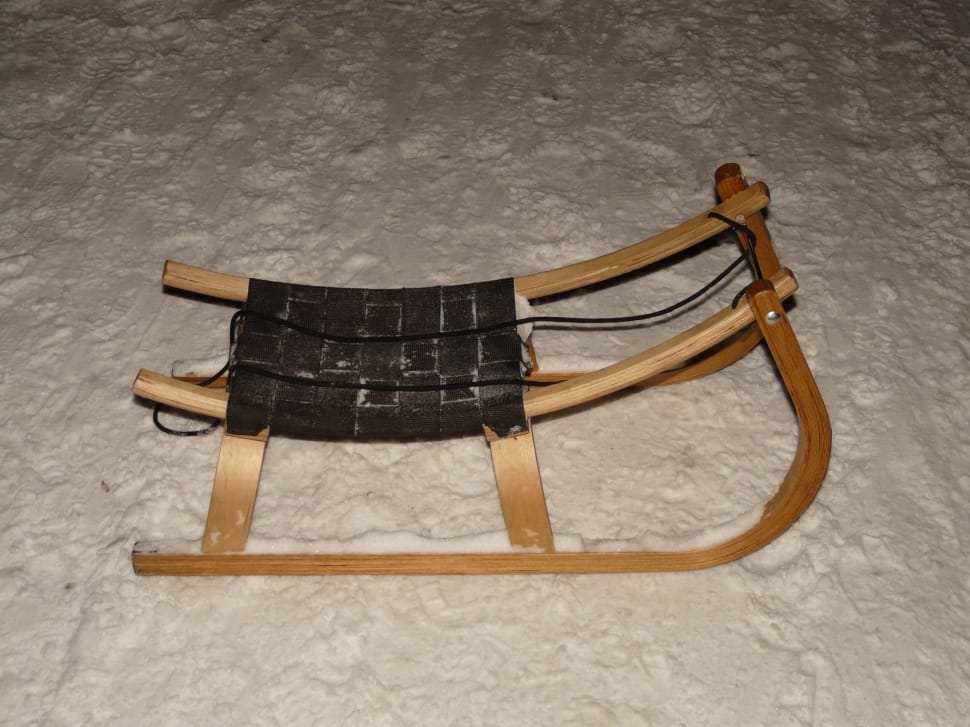 brown wooden black padded sled preview