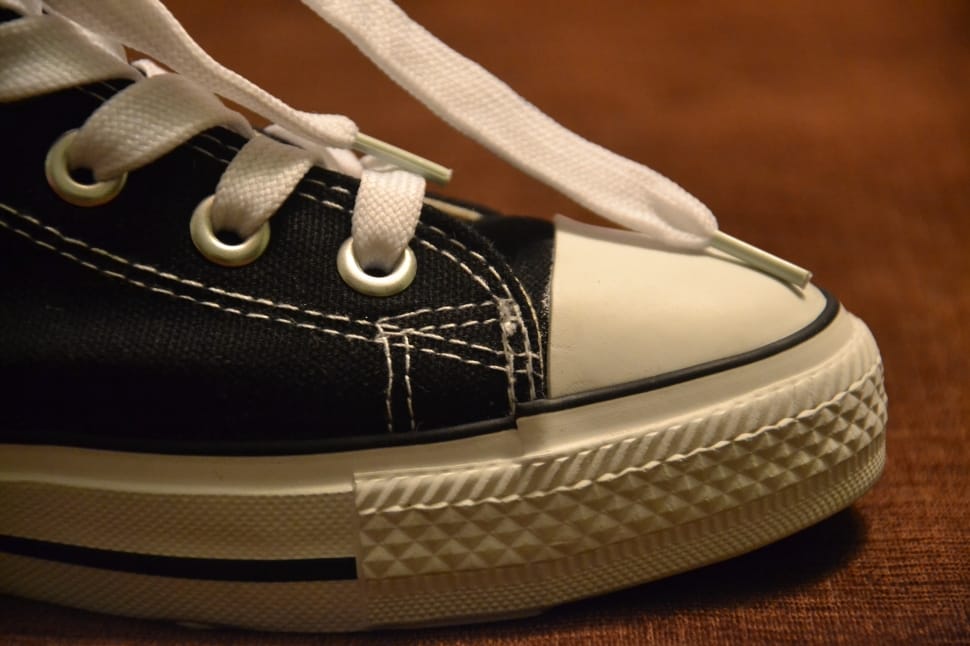 unpaired black and white sneaker preview