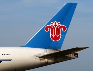 white and blue airplane thumbnail