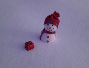 snowman amigurumi and red gift box miniature thumbnail