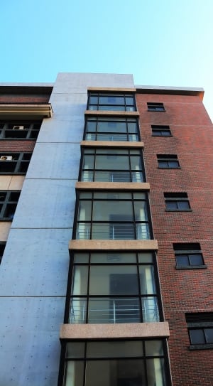 brown and grey mid rise building thumbnail