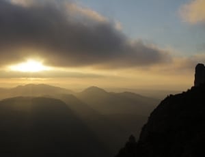 sun set photograpy on mountains thumbnail