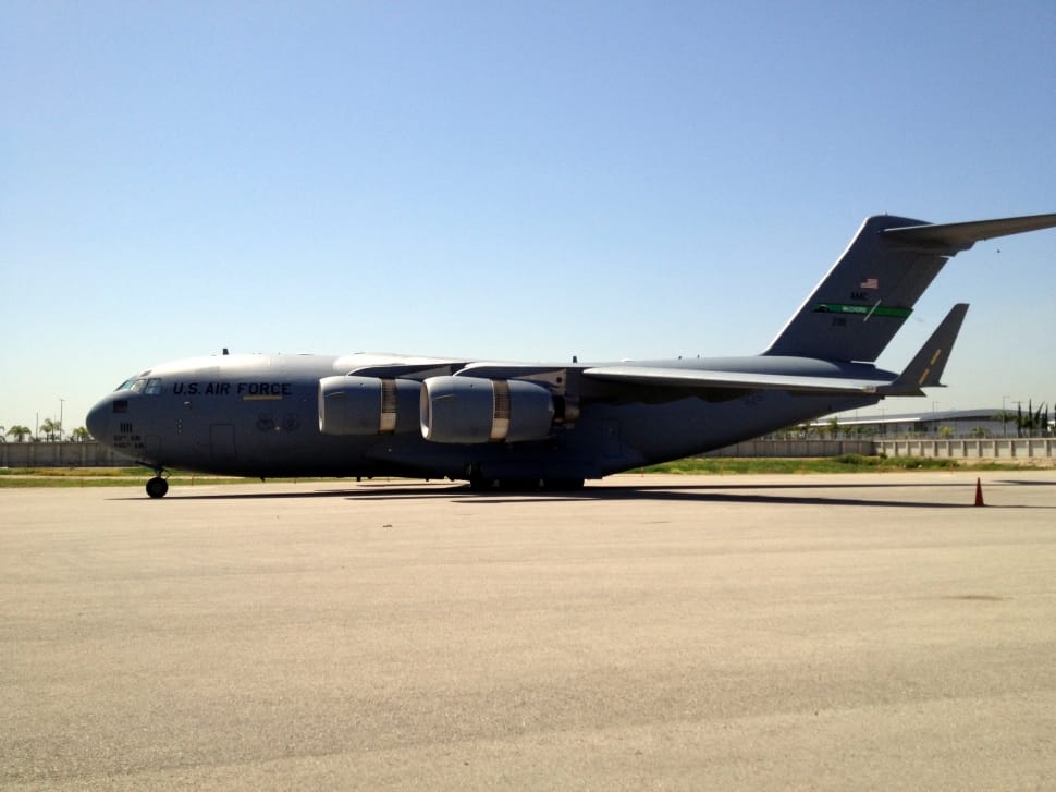 c-5 galaxy military cargo plane on airport during dayttime preview